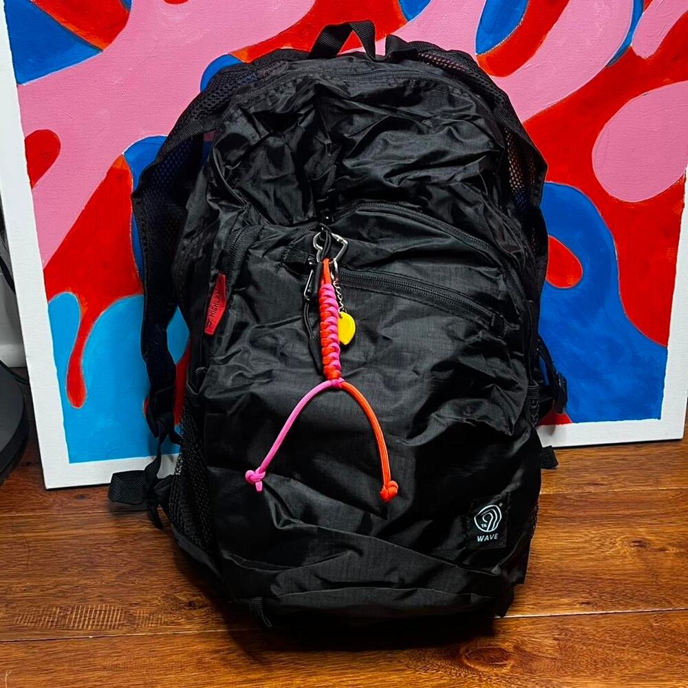 Black wave backpack with red